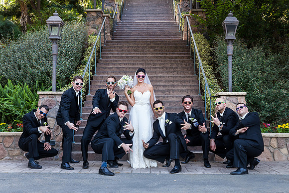 The bride and men by Temecula Wedding Photographer at Pala Mesa Resort