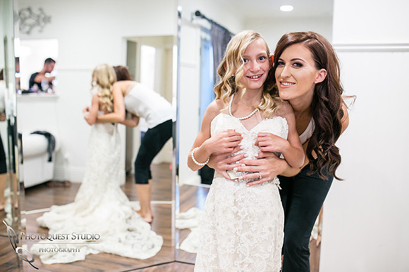 Young girl wear her Mom wedding dress