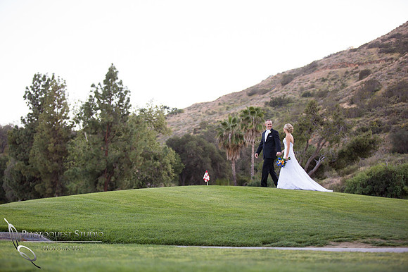 Bride & Groom walking on the Golf Course at Pala Mesa Resort Wedding