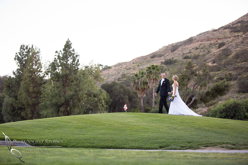 Bride & Groom walking on the Golf Course at Pala Mesa Resort Wedding
