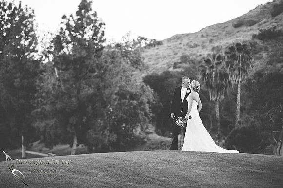 Bride and Groom kissing on the Golf course, Pala Mesa Resort Wedding Temecula Wedding Photographers