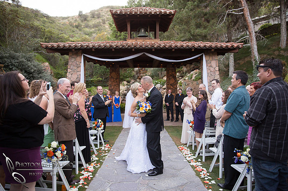 The 2nd kiss at Pala Mesa Resort Wedding photo by Temecula Wedding Photographers