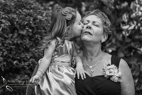 Kissing Grandma at Grand Tradition Estate, Happy Mother Day by Wedding Photograher in Temecula