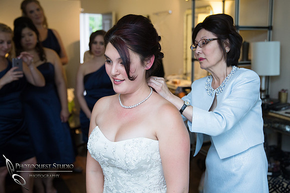 Mom helping the bride at Pala Mesa Resort Fallbrook by Temecula Wedding Photographer