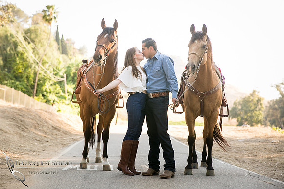 Kissing by horses atFairmount Park, Mission Inn, Riverside Downtown by Temecula Wedding Photographer