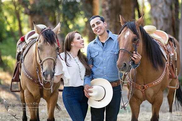 Cute moment Fairmount Park, California Engagement Photo with Horses by Temecula Wedding Photographer