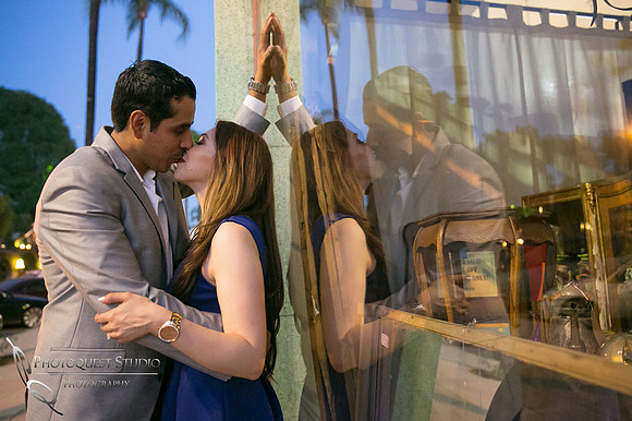 Mirror kissing at Mission Inn California Engagement Photo by Temecula Wedding Photographer