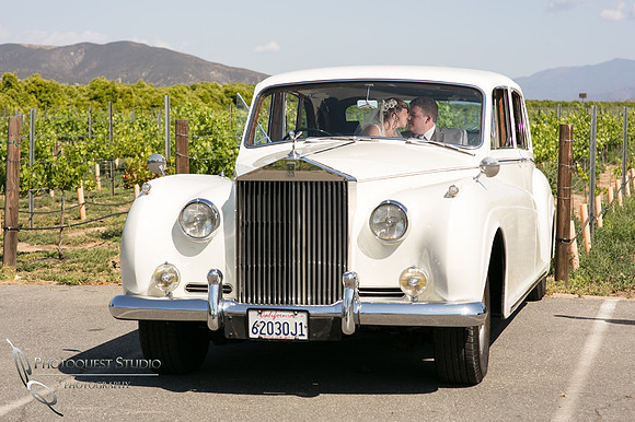 Wedding photo with Rolls Royce car at Wiens Winery by Temecula photographer, Chloe and Colby