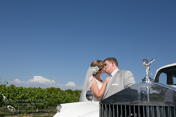 Wedding photo with Rolls Royce car at Wiens Winery by Temecula photographer, Chloe and Colby