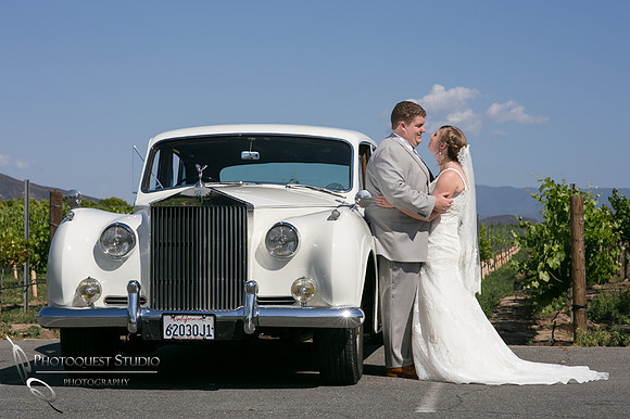 Wedding photo with Rolls Royce car at Wiens Winery by Temecula photographer, Chloe and Colby