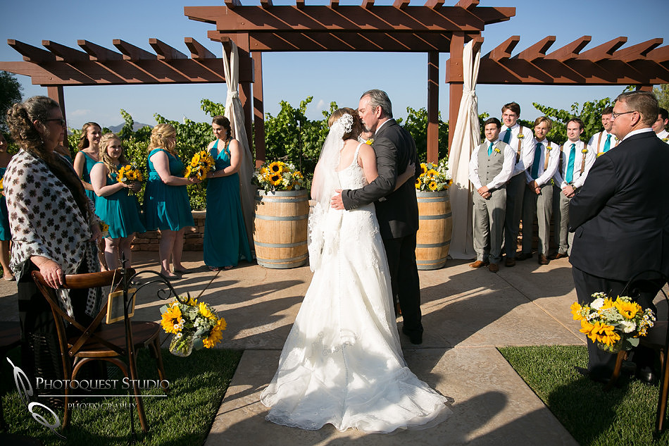 Wedding photo with Rolls Royce car at Wiens Winery by Temecula photographer, Chloe and Colby