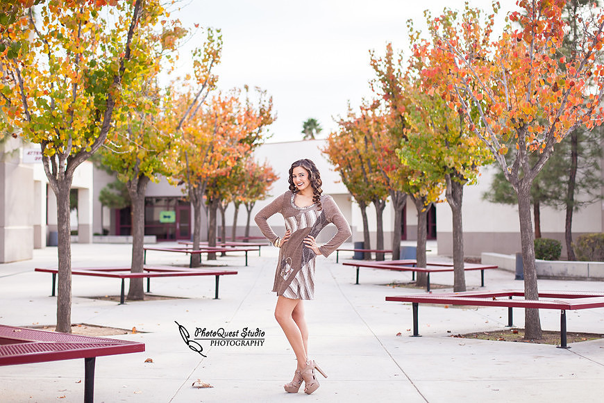 High School Senior photos session of beautiful Latina Teen from Menifee, California - Miss Isabel Donadio.  Location: Paloma Valley High School, Menifee, CA.  Photography: PhotoQuest Studio - Menifee Wedding, Family and Event Photographer - School Courtyard