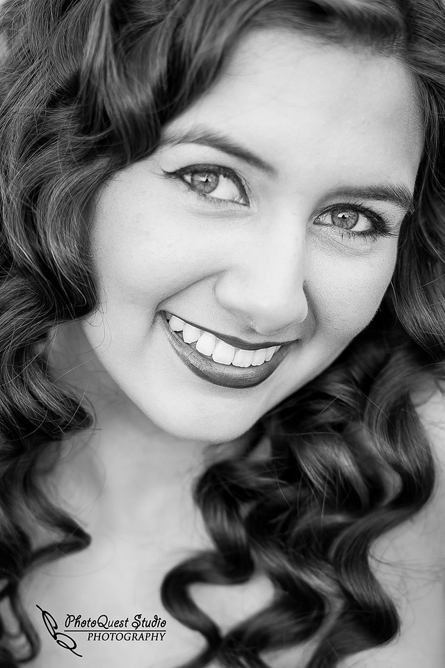 High School Senior photos session of beautiful Latina Teen from Menifee, California - Miss Isabel Donadio.  Location: Paloma Valley High School, Menifee, CA.  Photography: PhotoQuest Studio - Menifee Wedding, Family and Event Photographer, closeup head shot of Isabel Donadio