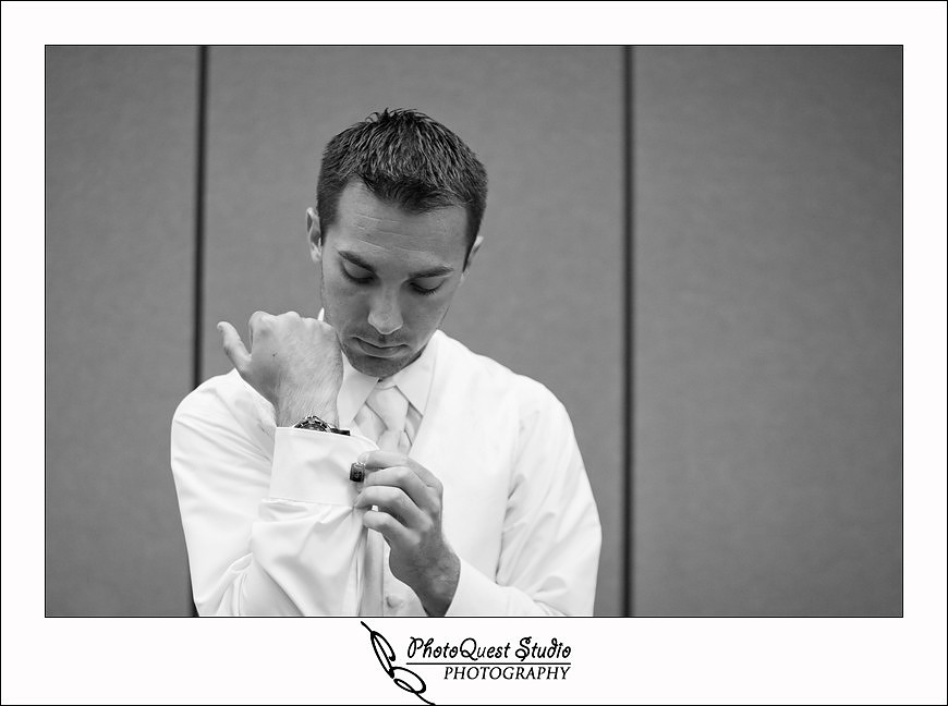 South Coast Winery Wedding Photography by Temecula, Menifee, Murrieta Wedding Photographer. The groom putting on cufflink