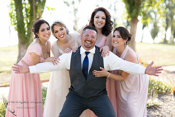 happy brother and sisters at wedding