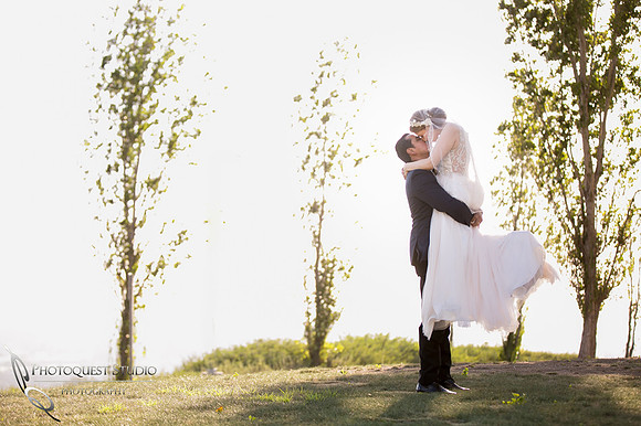 holding and kissing by temecula wedding photographer