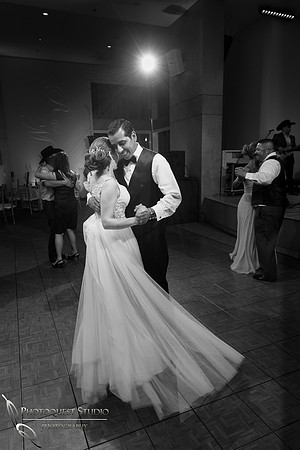 bride and groom dancing black and white