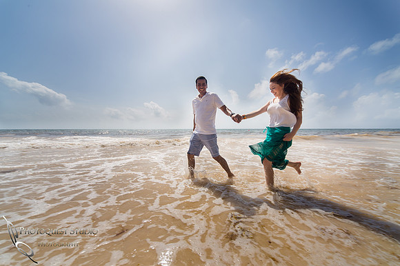 running on the beach, honeymoon photo in cancun mexico by temecula wedding photographer