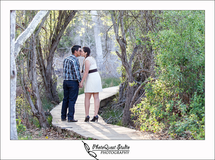 Romantic Temecula Old Town and Fallbrook Sunset Engagement Photo Session by Menifee, Temecula Wedding Photographer - Future Bride and Groom kissing at the park in Fallbrook