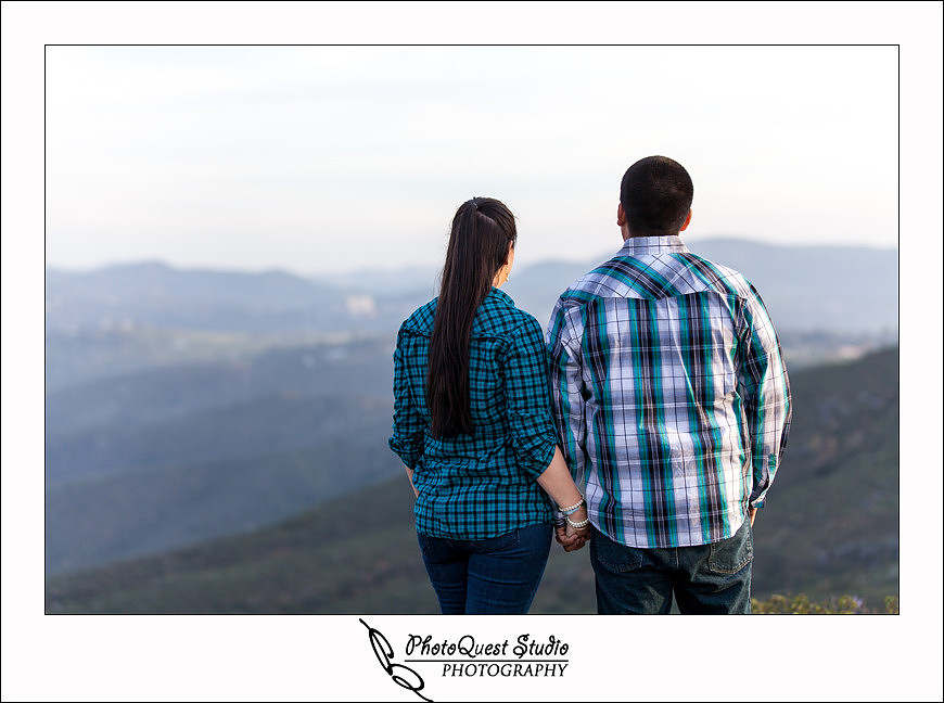 Valley Center Mountain Top Engagement Photo Session by Menifee wedding photographer, Murrieta wedding photographer, Temecula Wedding Photographer, Valley center wedding photographer - Jessica & Lee looking down Valley Center from the mountain top at sunset