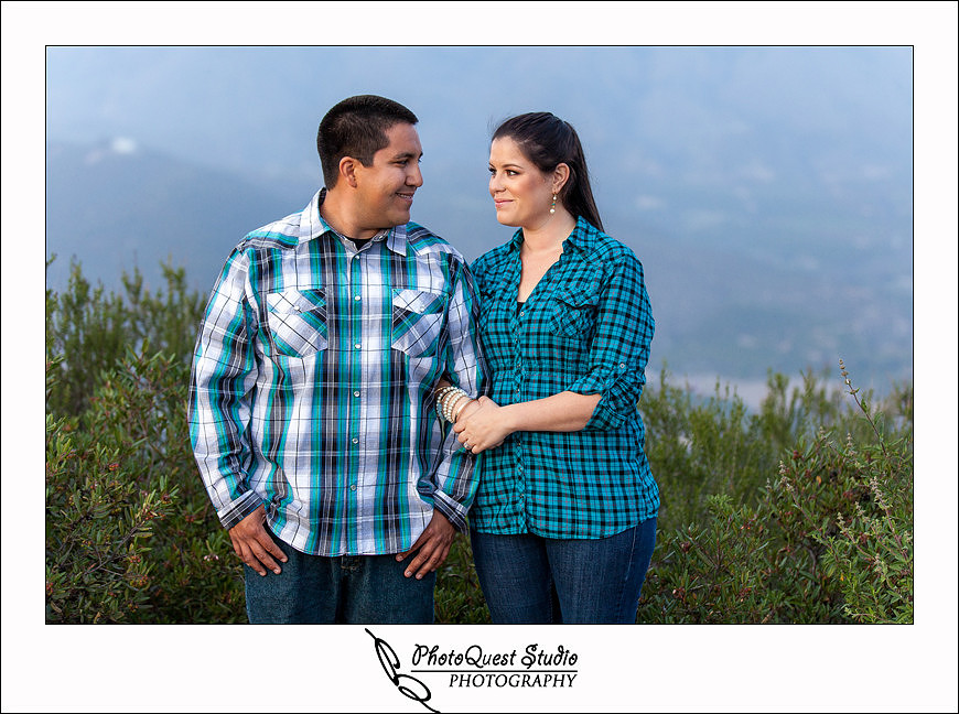 Valley Center Mountain Top Engagement Photo Session by Menifee wedding photographer, Murrieta wedding photographer, Temecula Wedding Photographer, Valley center wedding photographer - The look of love for each other from the mountain top sunset
