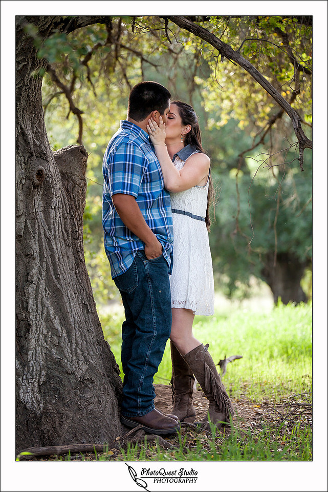 Valley Center Mountain Top Engagement Photo Session by Menifee wedding photographer, Murrieta wedding photographer, Temecula Wedding Photographer, Valley center wedding photographer - Kissing under the big tree