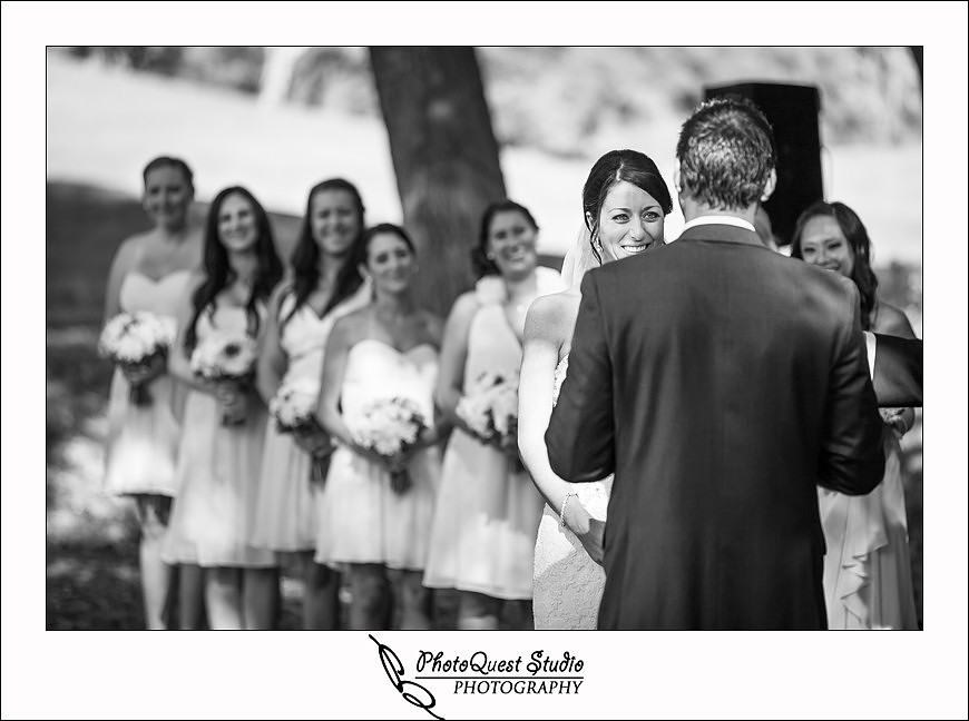 Temecula Creek Inn Wedding Photo by Temecula Wedding Photographers - the bride looking at the groom