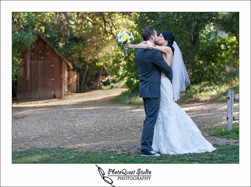 Temecula Creek Inn Wedding Photo by Temecula Wedding Photographers - bride and groom kissing