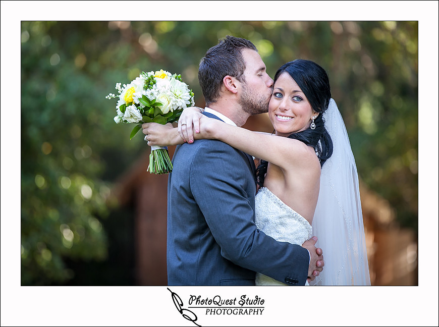 Temecula Creek Inn Wedding Photo by Temecula Wedding Photographers - he kiss her