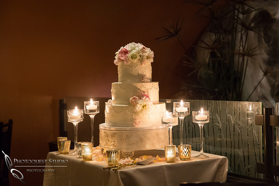 wedding cake with candle at Brodard Chateau Wedding
