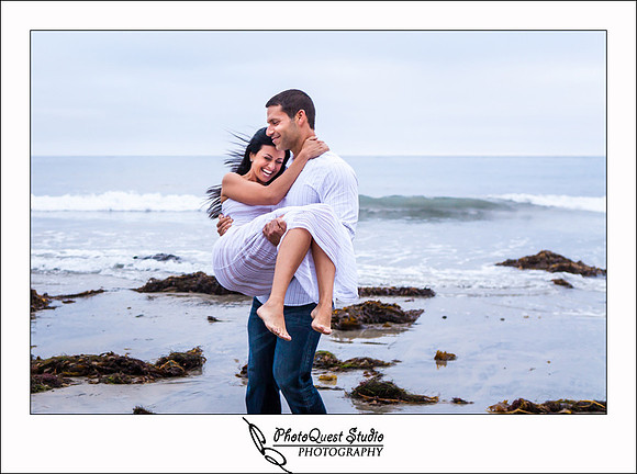 Oceanside engagement photo by temecula wedding photographer of photoquest studio photography at swami beach.
