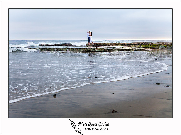 Oceanside engagement photo by temecula wedding photographer of photoquest studio photography at swami beach.