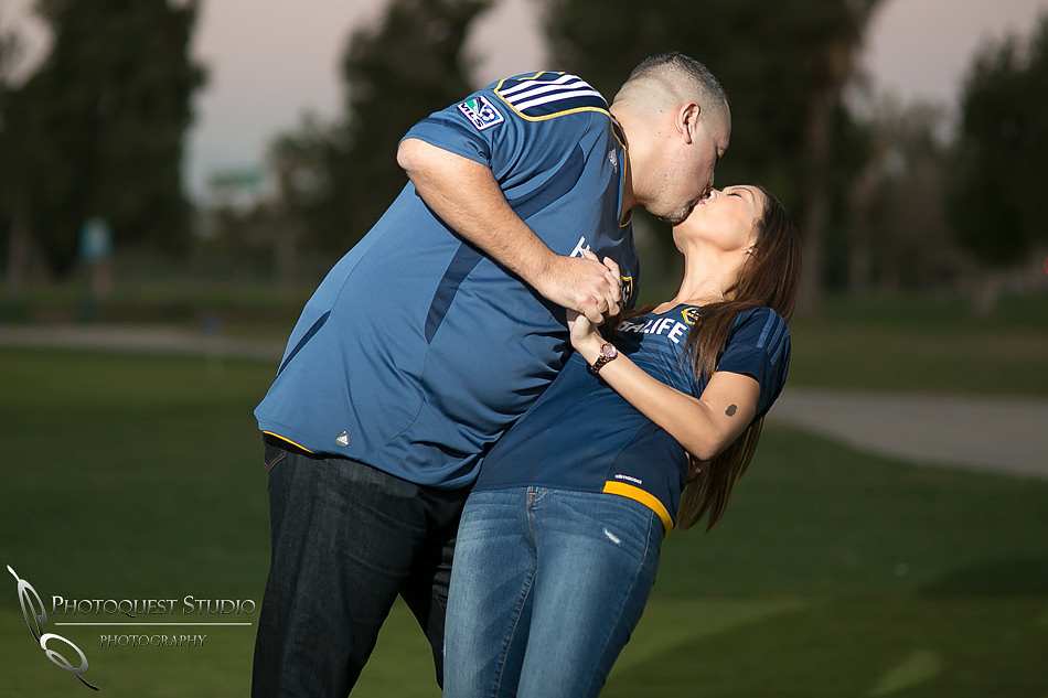 dip and kiss engagement photo