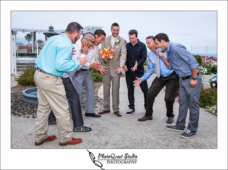 Carlsbad Beach Wedding by Temecula Wedding Photogarpher of Photoquest Studio, Photography, the groom show off his ring to his men
