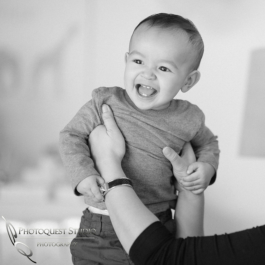 Happy Baby Boy at Hunter's 1st Birthday Party White and Gold Theme