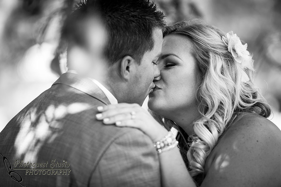 the very first kiss of the groom and the bride, Champagne Village, Valley Center Wedding by Temecula Wedding Photographer of Photoquest Studio, Photography