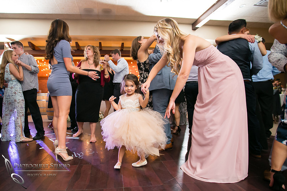Bridesmaid and the Flower girl dancing