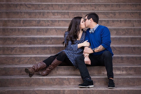 Kissing on the stairs Temecula Wedding Photographer Pala Mesa Resort and Golf Cournt Engagement