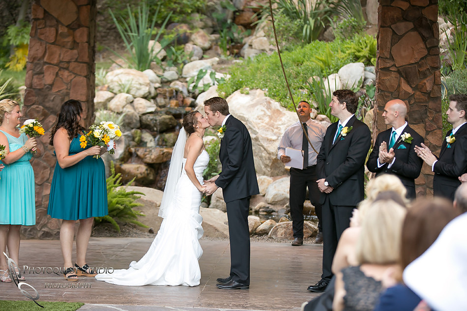 Ashley-&-Kyle first kiss-photo-at-Pala-Mesa-Resort-by-Wedding-Photographer-in-Temecula