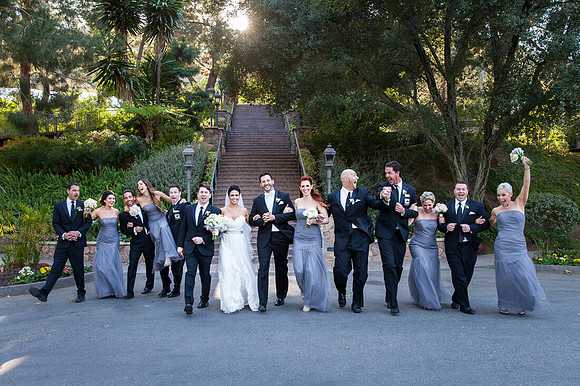 Wedding party having fun with the bride and groom. Temecula Wedding Photographer document Pala Mesa Resort Wedding