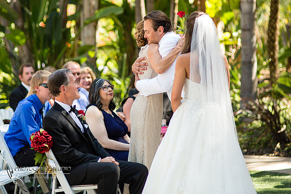 groom hugging the bride mom at Grand Tradition Estate  wedding