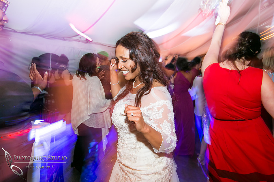 the bride shows her move on the dance floor
