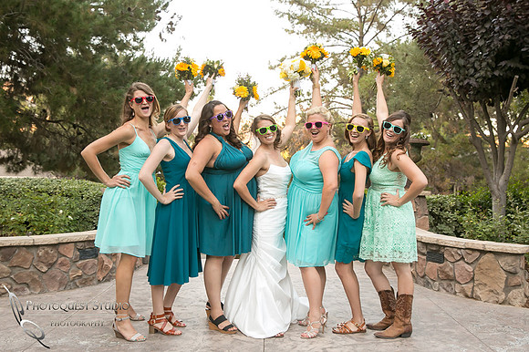 beautiful bride and bridesmaids cheering