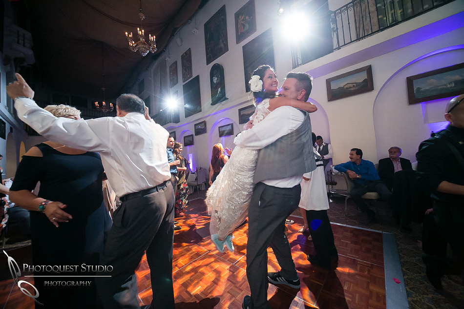 Bride and Groom happy spin by Temecula Wedding Photographer of Photoquest Studio Photography