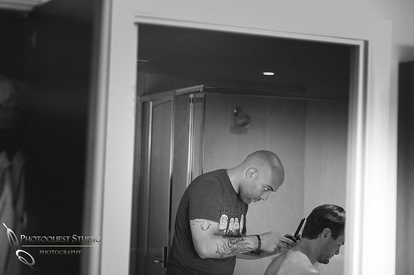 Bestman trimming the Groom hairs