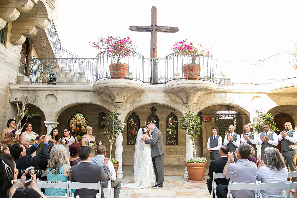 The first kiss at Mission Inn Hotel Wedding Photo