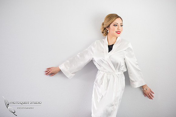 Bride looking out the window, Wedding Photographer in Temecula, Mexican Traditional Wedding