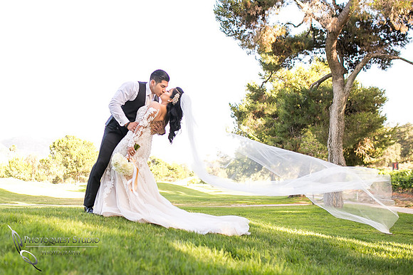 Dip and kiss by Temecula Wedding Photographer at Pala Mesa Resort, Fallbrook, San Diego, California.