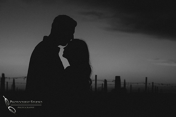 forehead kiss in black and white