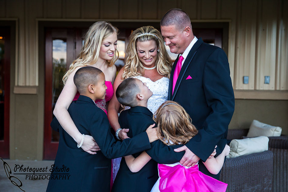family at first look at Wiens family cellars temecula winery by temcula wedding photographer